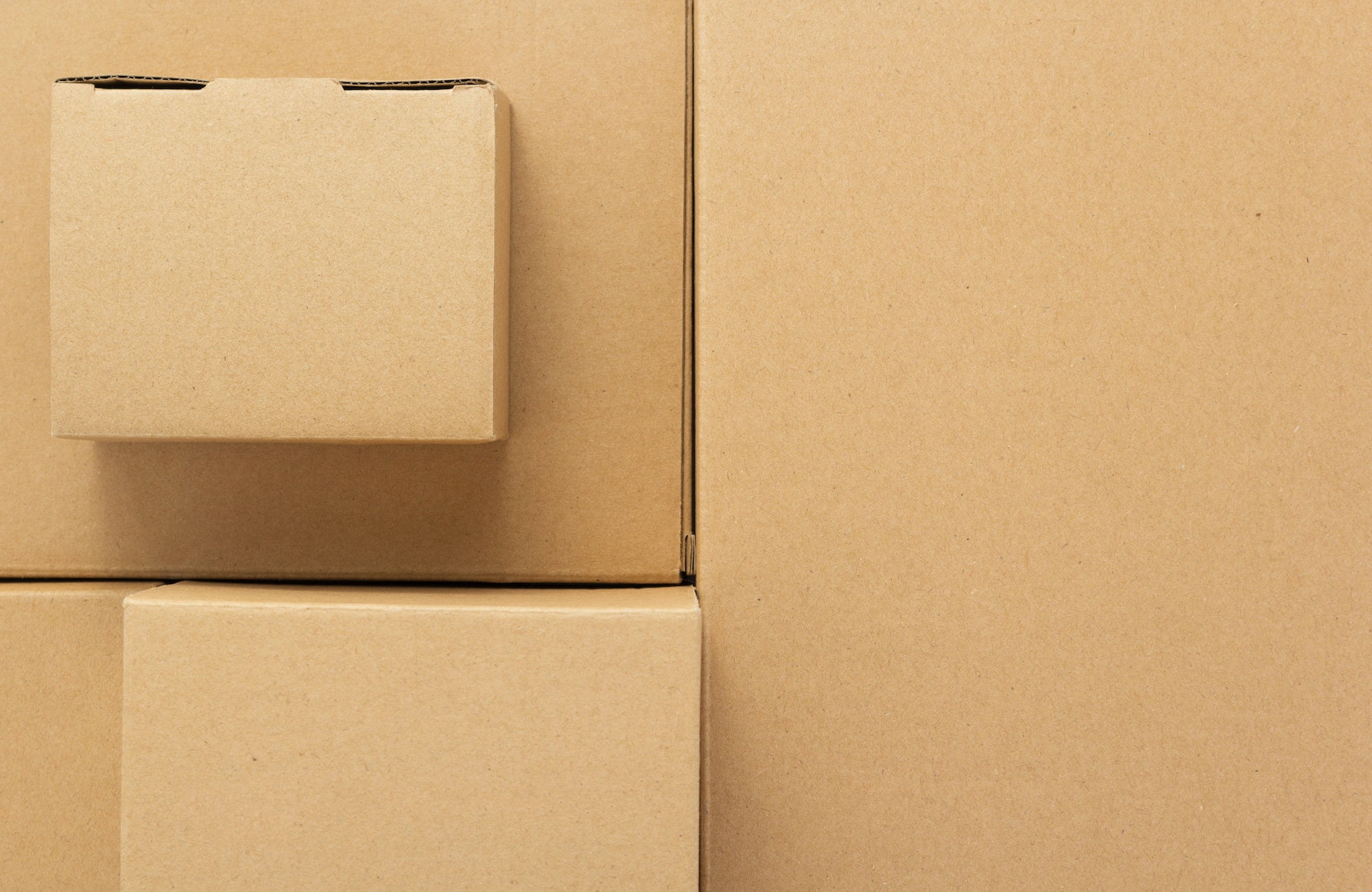 A stack of cardboard boxes on a white background.
