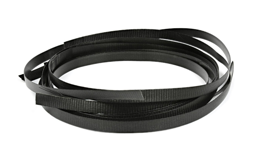 Packaging supplies with a black rubber band on a white background.